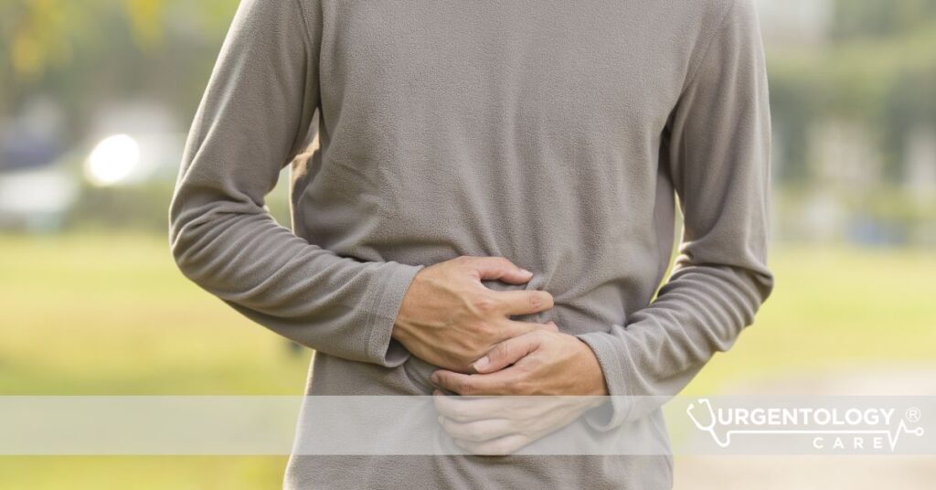 man holding stomach in pain