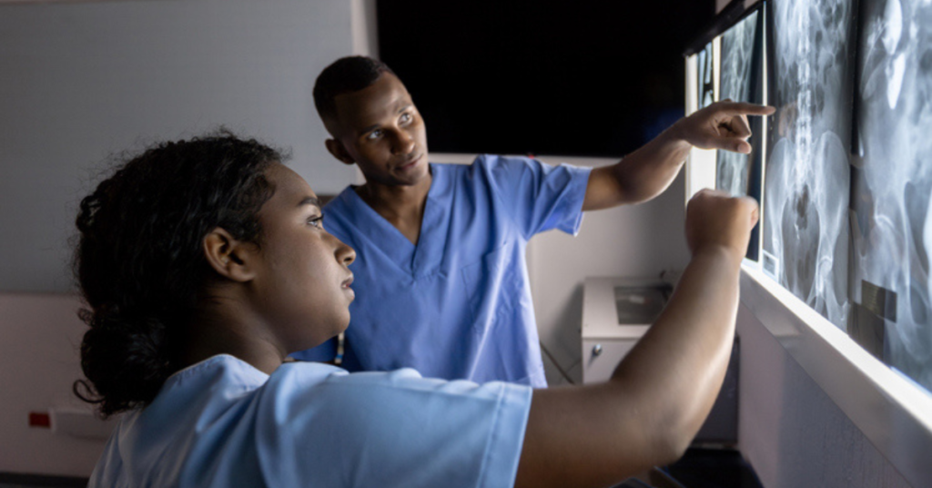 Doctors looking at xrays