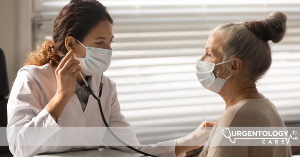 Doctor checking woman's heart